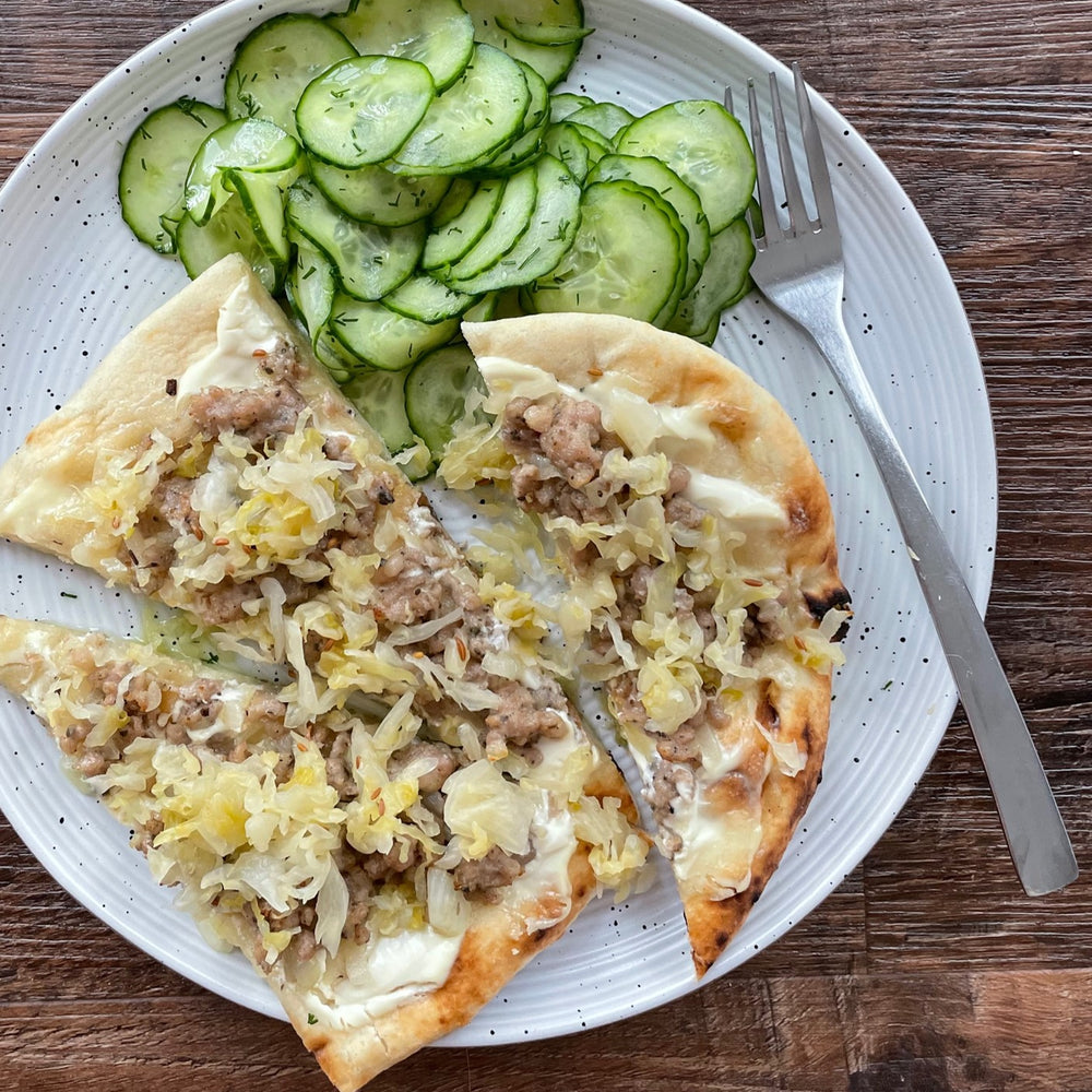 German Sausage Pizzas With Sauerkraut & Dill Pickled Cucumber Salad