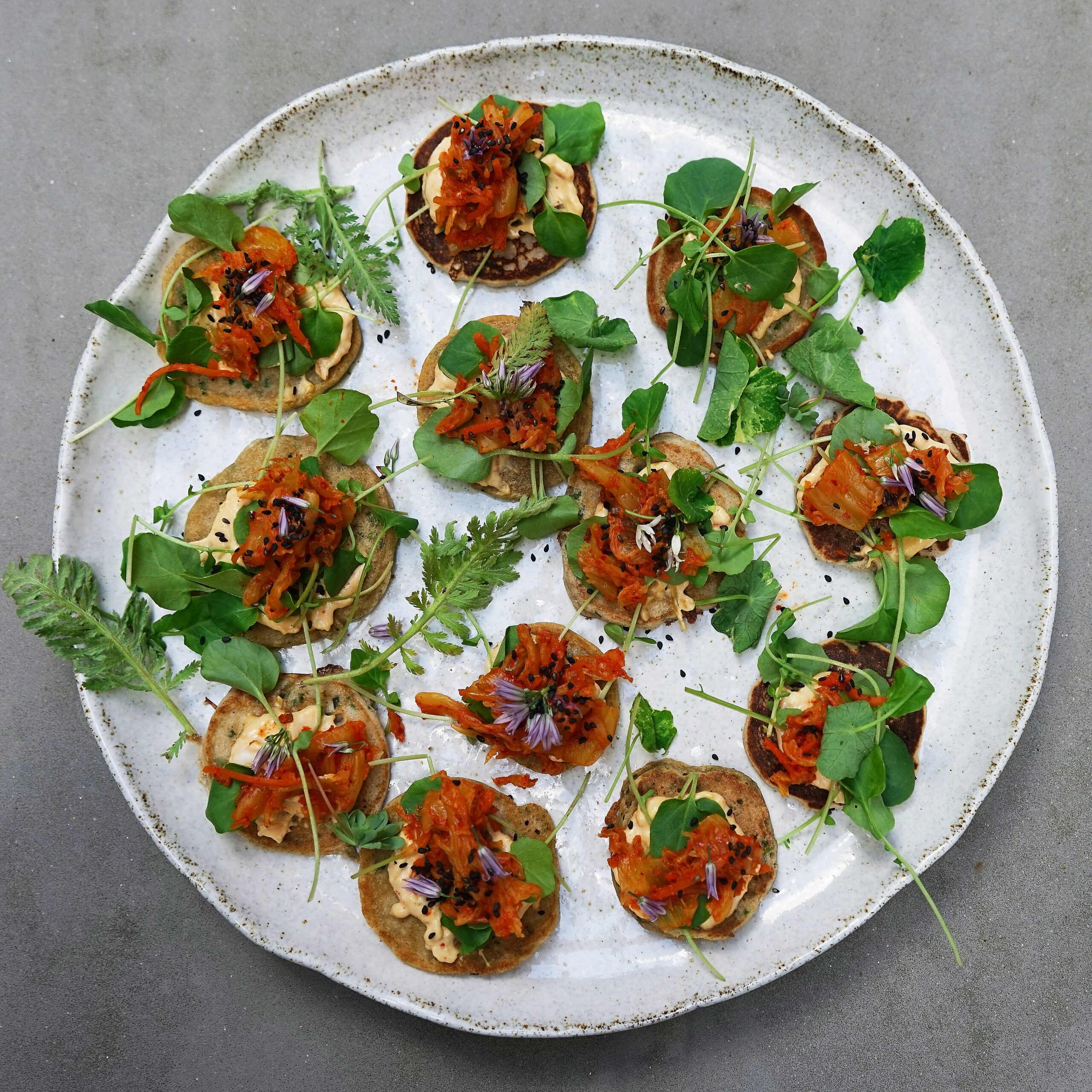 Bettina’s Blinis with Kimchi, Kimchi Mayo & Greens