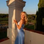 London-based digital and lifestyle influencer Francesca, a blonde lady wearing a long blue dress.